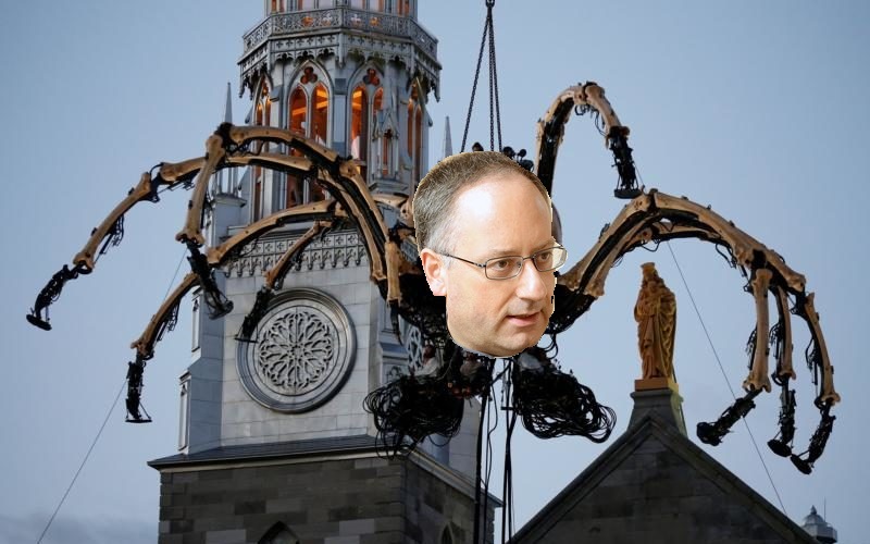 An omen? A giant Spidero appears outside Ottawa's Notre-Dame cathedral.