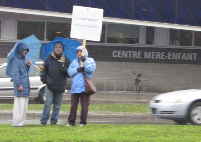 A few brave Christians in the rain