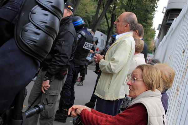 Policemen protecting a few prayerful pro-lifers.